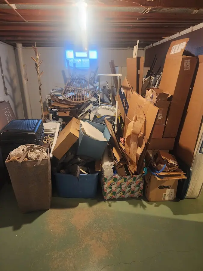 Roll-off dumpster container at job site for 4 Yard Dumpster Rental in Clovis